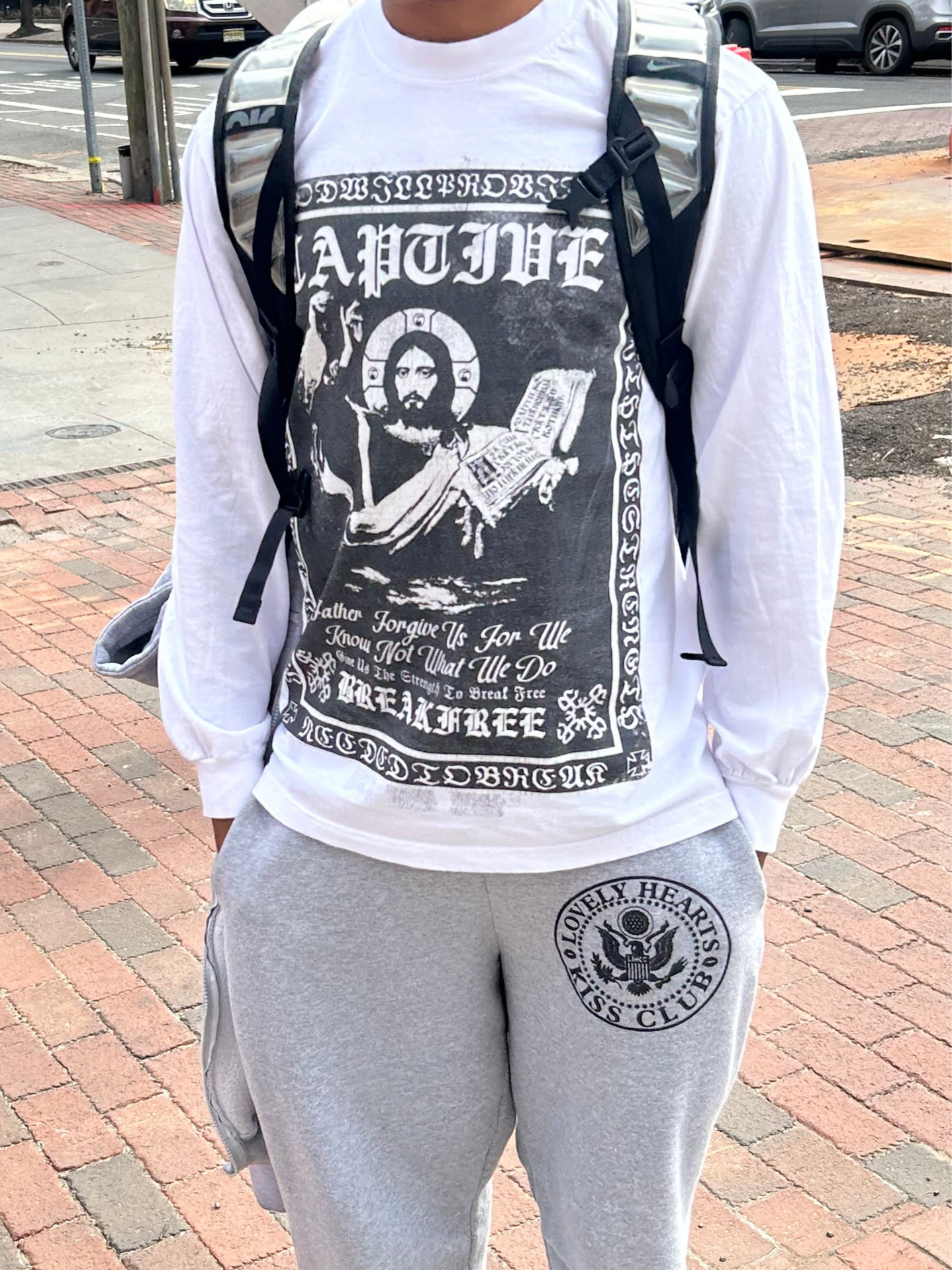 “$aint Of $truggle" Longsleeve